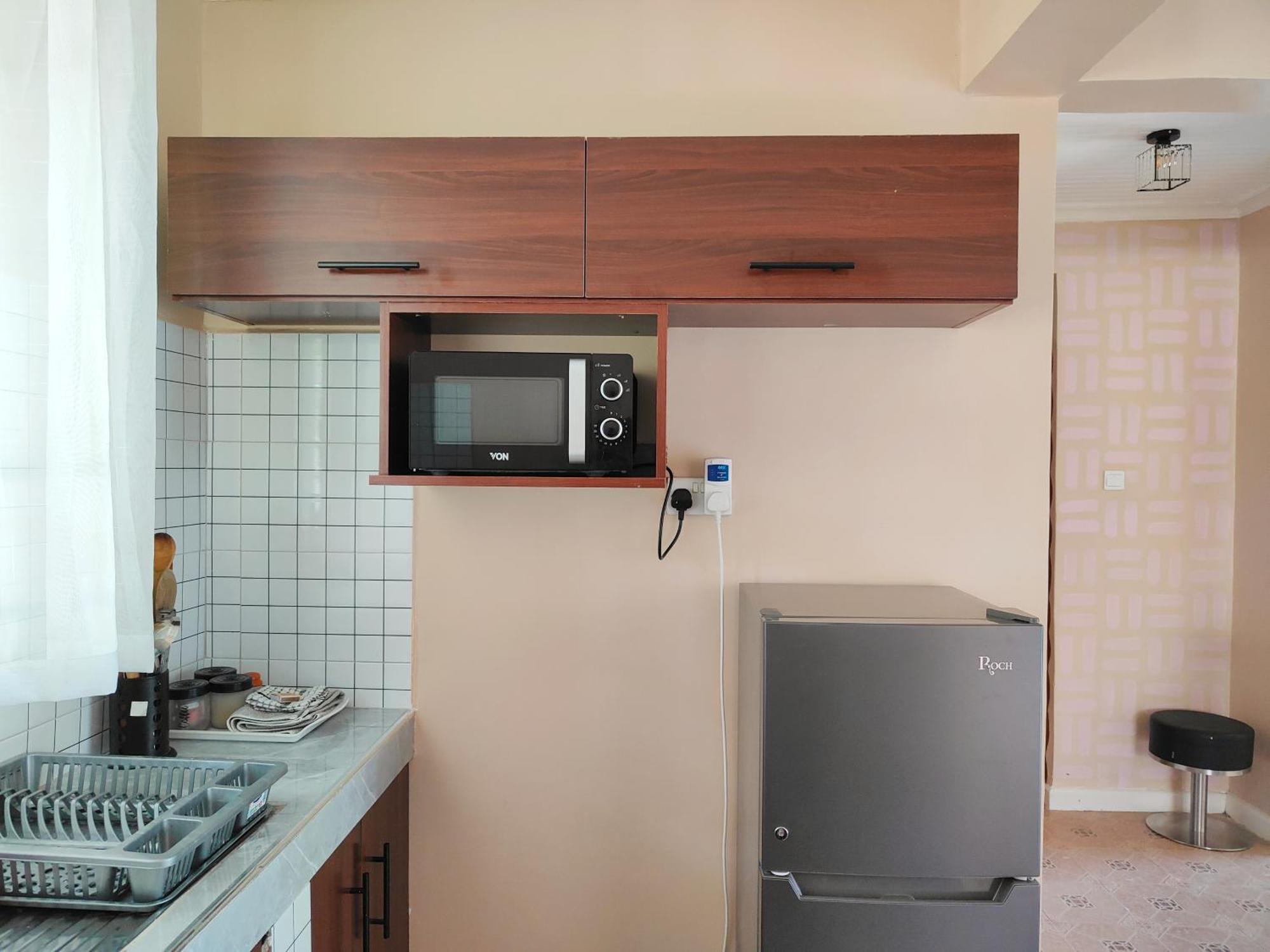 Ferienwohnung MILIMANI DRIVE LIVING I LUXE FLAWLESSLY FURNISHED UNITs Kisumu Zimmer foto
