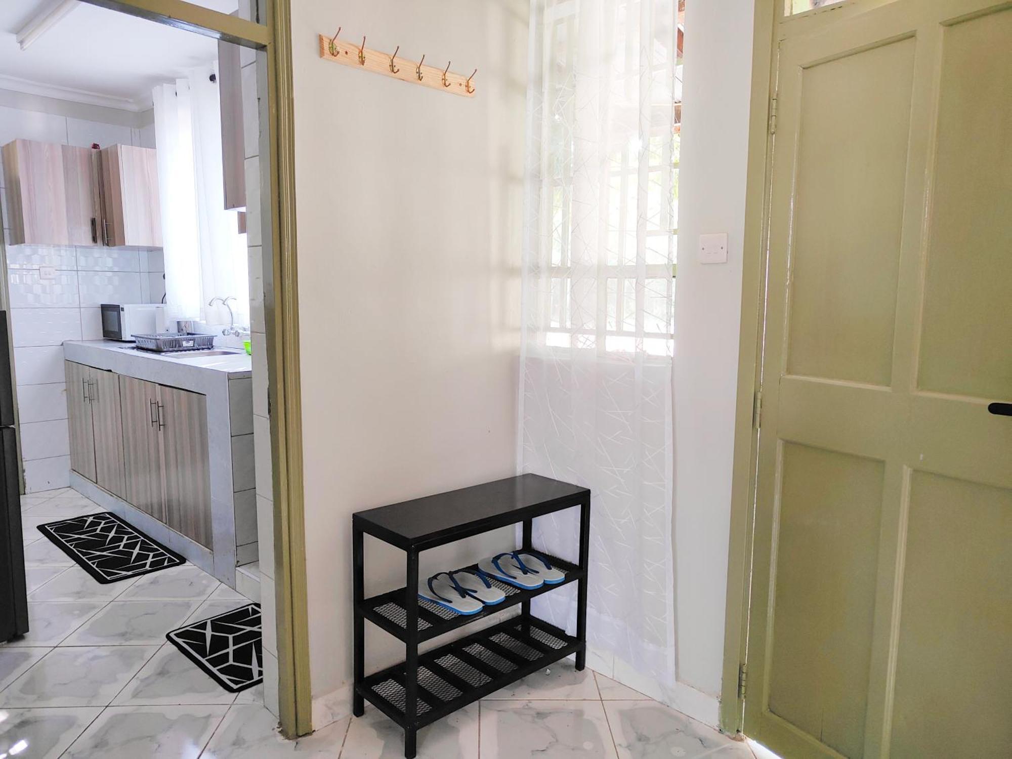 Ferienwohnung MILIMANI DRIVE LIVING I LUXE FLAWLESSLY FURNISHED UNITs Kisumu Zimmer foto