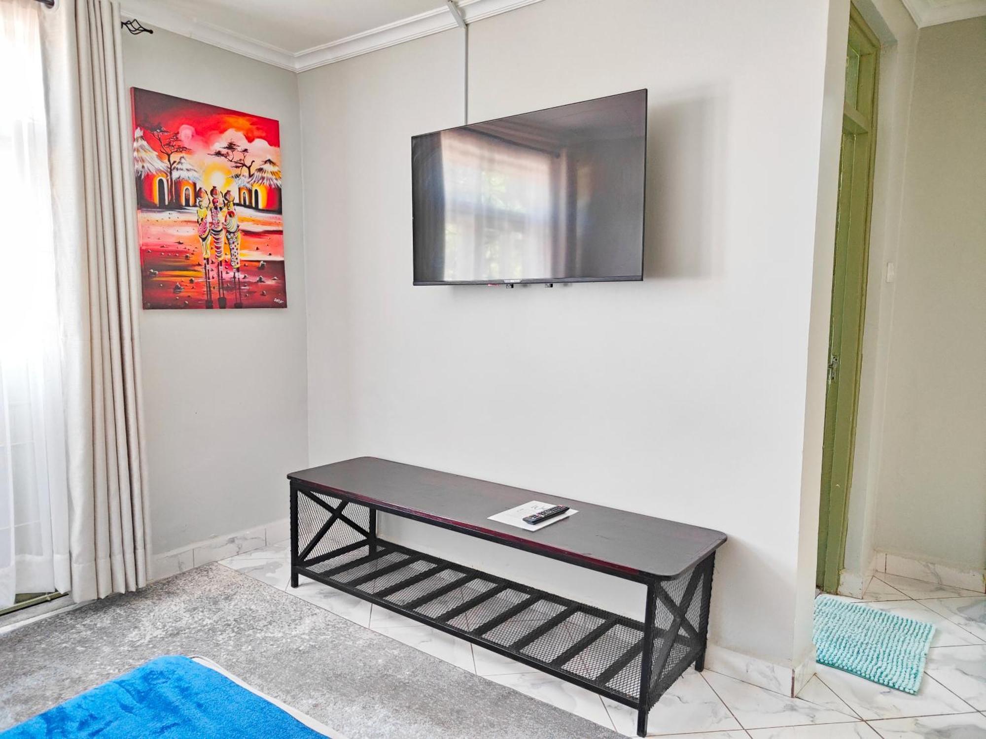 Ferienwohnung MILIMANI DRIVE LIVING I LUXE FLAWLESSLY FURNISHED UNITs Kisumu Zimmer foto
