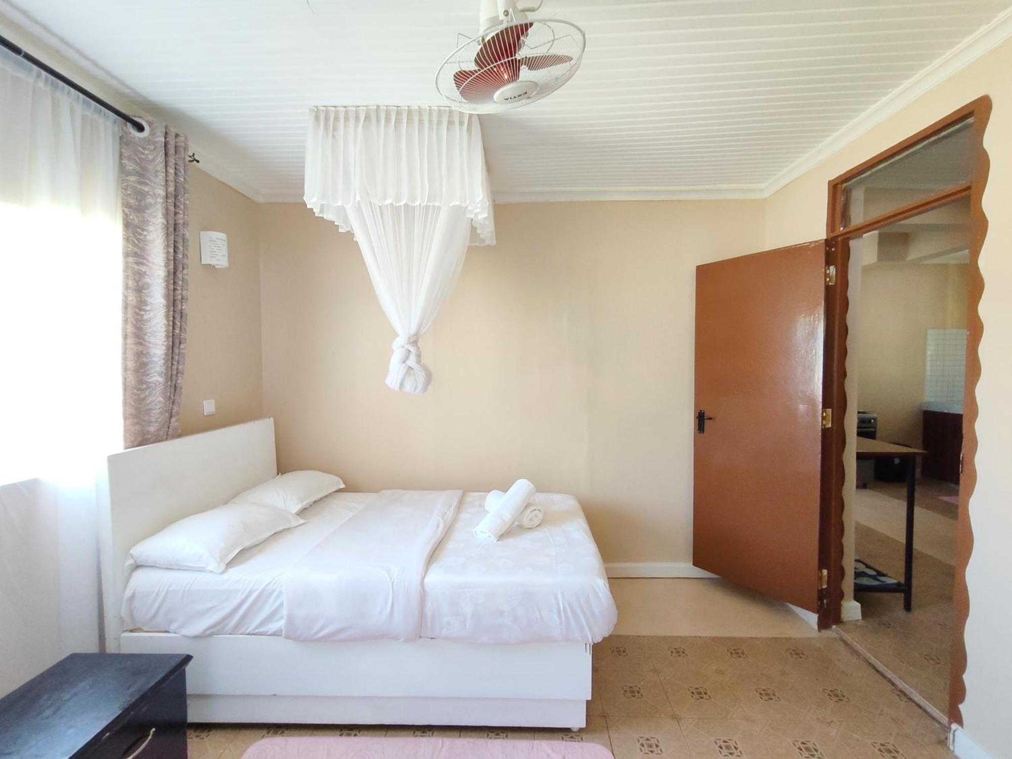 Ferienwohnung MILIMANI DRIVE LIVING I LUXE FLAWLESSLY FURNISHED UNITs Kisumu Zimmer foto