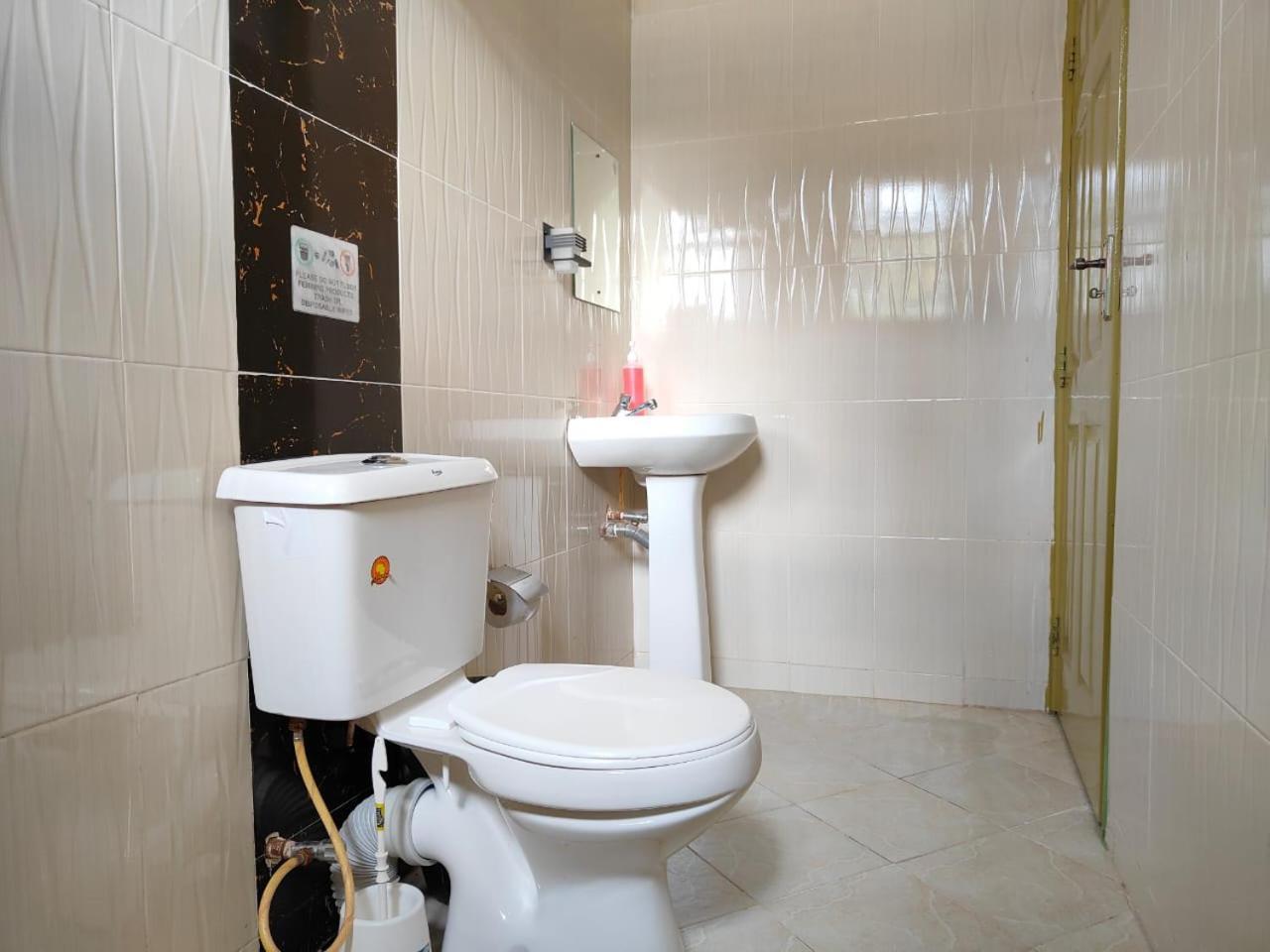 Ferienwohnung MILIMANI DRIVE LIVING I LUXE FLAWLESSLY FURNISHED UNITs Kisumu Zimmer foto